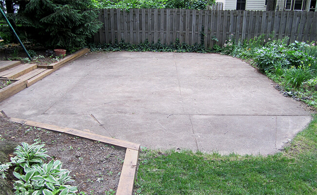 prepping shed build site with concrete foundation