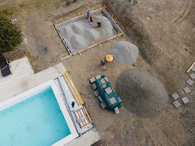 preparing shed build site with conrete pavers